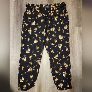 Torrid Black Pants with Yellow Floral Print